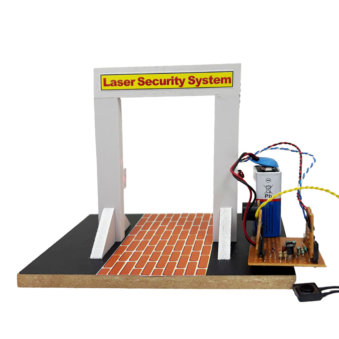 Explore our Laser Security Alarm System, a model featuring an archway, a compact circuit board with wires, and a battery pack, all elegantly mounted on a brick-patterned base. 